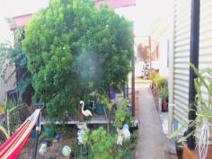 16 Russell St Chinchilla QLD 4413
4 bedroom iron cladded home with steel stumps on lg 1012m2 allot.
Semi-mod kitchen w/ walk in pantry and electric stove. 3 bedrooms have
built in cupboards. Evap air con throughout & s/s in main b’rm with
the large lounge room having a wood heater. The bathroom has been
renovated. An extra family room adds that extra space everyone looks
for. All floors are polished and carpet to the bedrooms. Double batts in
the walls & ceiling makes this home very comfortable in all
weather. Exterior features include rear patio with a shaded bbq area,
fully fenced yard, small rain water tank, dbl carport & storage
shed, dbl garden shed & solar panels with 3kw invertor on the new
roof to save on power bills. With the home situated to one side of the
block, this would suit the developer to build again. Currently rented at
$400 p/w.