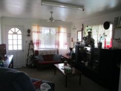 Tivoli, QLD, 4305 - Walkers Real Estate Good central location within a few minutes by vehicle to highway,
Riverlink shopping complex. Handy to Primary schools. Bus transport
available at door. Dwelling features 2 bedrooms, master with built-ins,
formal lounge, spacious kitchen with dining attached, large carport,
outdoor BBQ/recreation area. No flood. Space for a shed or pool. 818m2
allotment