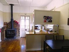 WOODENBONG, NSW 2476 This beautiful cottage is located in the township of Woodenbong, under 1.5hrs to Brisbane, Gold Coast and Byron Bay. Positioned in a high spot in town, it has magnificent views to the surrounding Border Ranges. Features Include: - Three bedrooms, two with built-ins - Timber floorboards - French doors opening onto the front and rear deck areas - High ceilings with original horizontal timber wall boards - Intricate timber fret-work throughout - Large bathroom with shower and bathtub - Open plan kitchen and dining area - Combustion wood fire to keep you warm in winter - Single lock up garage - Quarter acre allotment