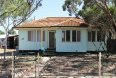 14 Snell St Merredin WA 6415 Great value 3 bedroom home with front lounge room, kitchen with room for dining table and rear double carport / shed. This little home is great value and located in a nice location opposite the bushland. Front lounge room with a wall unit air conditioner. The kitchen has room for your dining table and has a gas oven and stove top. The three bedrooms are carpeted and are all reasonable sizes with security screens fitted to the windows. The bathroom is the old style with the shower over the bath tub. The laundry is to the rear of the house and has a seperate toilet. The back yard has huge bird cages all set up plus the large double rear carport / shed that you can park in. This property is currently leased at $210 per week. This is a cheap little home and the owner is open to all offers so contact us now to arrange an appointment to view this property. Viewings are by appointment only (as we have to arrange a time with the tenant) and are on Thursdays of each week. Contact us at the office on 9574 2917. Features Smoke Alarms, Safety Switch, RCDs. Property Details Bedrooms3Bathrooms1Land Area790 m2 Agent Name: Tiffany Maddox Phone: Mobile: 0448 481 771 Agent Name: Tony Maddox Phone: Mobile: 0408 926 497