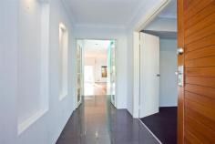 188 St Brigids Terrace Scarborough WA 6019 HOME OPEN; Saturday 9th August 2014 at 1:30 - 2:00pm Be
surprised with this contemporary built home that offers a generous 289sqm of
great living space on two levels. Modern open plan indoor/outdoor living space
on the lower storey with powder room, front formal lounge, fabulous alfresco,
remote double garage, & so much more...... Step
down to the expansive open plan dining and family area. Two sets of Bi fold
doors allow outside air & light to permeate this space, leading onto a fabulous
decked alfresco overlooking the beautiful lush green courtyard garden with in-ground
water feature. The kitchen also catches the natural light & is spacious with
a walk-in pantry & good bench/cupboard work space. Entry
to
the upper storey begins with pleasant views towards the Indian Ocean
from the rear balcony off the open sitting room which nicely separates
the master & minor bedrooms. The layout consists of the master
bedroom
with floor to ceiling BIR robes & ensuite, beds 2 & 3 both have
built-in study desks & robes, a modern bathroom and 2 x balconies -
one off
the master bed/sitting room and one off bedroom 2/passageway. Other
features: -
A fully lined attic accessed via a drop down ladder -
Polished timber flooring, select tiling & neutral decor -
Reverse cycle air conditioning -
Secure property access from the remote double garage with storeroom -
Beautifully landscaped/reticulated & mature gardens with delightful water
feature.
Very
centrally located with all amenities close by including shopping, Scarborough Beach,
Hale School, St Mary's Anglican Girls School and City Beach Primary