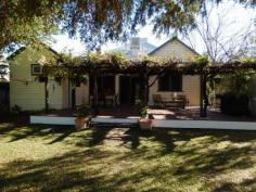 28 Boston Street Moree NSW 2400 AGELESS BEAUTY * 3 large bedrooms, main with dressing room and ensuite * Large centre hallway * Lounge/dining with fire place * Modern Kitchen with ample storage * Bathroom with vanity, toilet and shower over claw foot bath tub * Laundry with additional toilet and shower * Office and separate utilities room, gauzed front verandah * Large entertainment area with timber decking * 3 bay lockable shed with three phase power and cement floor * Six bay solar panels * Large 1,415sq metre block fully fenced