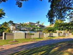 5718 Observation Crescent Sanctuary Cove QLD 4212 The "Pavilions"
is an architecturally designed home in excess of 90 squares with gate
house entry. Approx 1500m2; the block extends to 2 street frontages
with private access from both. In an elevated position the property
enjoys panoramic views across the golf course to the hinterland and
beyond. A unique residence in a very central position; it offers the
owner the opportunity to entertain on a very large scale in total
privacy. Upper Level: A stunning master suite with dual walk in robes and ensuite with spa. Full length balcony with a superb outlook over the golf course 3 more bedrooms with ensuites – 2 with walk in robes – 1 with built in robes Entry Level: Smeg kitchen with Caesar stone bench tops & walk in pantry Choice of several entertaining areas Formal lounge with gas fireplace Sauna – Rumpus – Full bathroom Media room & Study Family room with wet bar Alfresco entertaining with barbecue facilites and alfresco dining. Outdoors: Large terrace with serene views over the golf course Extremely private in-ground pool Screened florida room Garaging at both street levels. Easy care gardens . General Features Property Type: House Bedrooms: 4 Bathrooms: 5 Indoor Features Intercom Study Broadband Internet Available Built-in Wardrobes Dishwasher Air Conditioning Open Fireplace Outdoor Features Remote Garage Secure Parking Garage Spaces: 4 Balcony Courtyard Outdoor Entertaining Area Swimming Pool - Inground