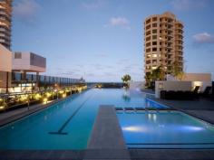 2105, 1 Oracle Boulevard, Broadbeach, Qld 4218 This is your chance to enjoy one of the most spectacular apartments on offer in the highly sought after front Tower at Oracle. Situated on the 21st floor, this huge 288sqm four bedroom apartment offers an abundance of extra features which really need to be seen to appreciated. Features include: *Four Bedrooms plus media Room *Two Living areas *Spectacular Views East and South *Gourmet Kitchen with Miele Appliances *Two car Spaces *Full resort facilities including two swimming pools, state of the art Gymnasium, Large Outdoor Entertainment Area with BBQ's and Tepanyaki Bar, Theatrette, Owners Executive Lounge and private wine locker and so much more!!!! CALL ANDREW RAMSEY AT BLACK LABEL PROPERTY ON 0412 022 840 to book your private inspection