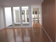 11/16a Frances Street Randwick NSW 2031 This stunning four level home has it all, with large open plan living polished timber floors in living and dining areas, large kitchen with dishwasher,wall oven,gas cook top,in Wall microwave and large island bench top with buffet and storage. you also have bi fold doors that open up and combine the whole level into open open and free flowing space which brings the outdoors in. On the third level you have three good size bedrooms with built in robes in all plus ensuite in main, you also have a study area for added convenience. The Main bathroom provides you with wet room that consists of a shower and large bath tub. On the fourth level you have an entertaining area that will have every body envious of the outlook of the city skyline and it would be just a delight to relax and enjoy and glass of wine or cold beer after hard days work. It does not stop with other features you have of the ducted air conditioning, triple car garage with remote control. internal entry to home, internal laundry, gas connection for BBQ its endless that's why i would put this one first on the inspection list.