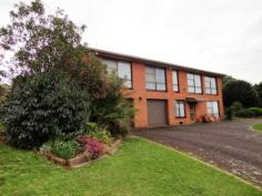 2 Greenacre Street, Upper Burnie, TAS 7320 Within minutes from Primary and Secondary schools as well as the popular shopping precinct of Upper Burnie this superior home is perfectly located for convenience. Situated on a massive block of approx. 2048 sqm with potential to be sub-divided (STCA) the home encourages you to relax, enjoy, entertain or indulge. You will be spoiled for choice as there are many areas throughout this home to accommodate family and friends alike. The welcoming entrance paints a picture of what to expect inside. Leading from the foyer is the study, second living room and double garage, which has been transformed to create a casual living space. The story continues as you move upstairs with the spacious living and family areas awash with natural light. A well appointed timber kitchen merges with the dining room providing a bright and inviting space for family activities. The master suite features built in robes and modern en suite, with the remaining 2 bedrooms incorporating built in robes. A modern stylish bathroom has been designed to accommodate a growing family and features a separate shower, bath and vanity. Guests will be impressed how the enclosed party room connects onto the large outdoor deck and undercover BBQ area with seamless integration, making this home an entertainer’s delight. From here you can wine and dine alfresco style while admiring the scenery of the expansive garden outlook. If you want a home that sets a trend for comfort, design and flexible family living, then this is the home for you.