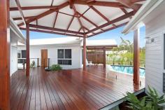 17 Sandals Boulevard Horseshoe Bay Magnetic Island Qld 4819 Perfect island living - built for the tropics with plenty of outdoor entertaining, pool and bright open living spaces. * Pavilion-style home with main living/dining/kitchen and two pavilions each with two bedrooms and bathroom, all connected by covered decks * Main living area opens onto the covered deck through extra wide sliding glass doors with windows and louvres on all sides to allow superb cross-ventilation. * The kitchen is a chef's delight with granite benchtop, quality appliances and soft-close drawers. * Polished hardwood floors feature throughout the property with tiled wet areas * Each sleeping pavilion features two spacious air-conditioned bedrooms and a stunning contemporary bathroom. The main bathroom features a freestanding bath and two-way access creating a master ensuite bedroom. All bedrooms feature built-in-wardrobes. * Outdoor living is what this home is all about with expansive decking making a feature of the sparkling saltwater pool and two large covered areas so you can entertain outside come rain or shine. * With a carport and automatic irrigation for the tropical landscaped gardens, all the work has been done ready for you to move in and enjoy! * A short walk on the scenic boardwalk brings you to the sandy Horseshoe Bay beach with its village-like atmosphere - join the locals at the pub, browse the shops or regular market stalls, hire a jet-ski or just relax under a shady tree with an ice cream.