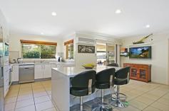 79 Gardenia Dr Bonogin QLD 4213 Great Family Home On A Massive Useable 2500m2 Block With Powered Shed! Located on a quiet street in Bonogin, this fabulous family property is just 10 minutes from Robina Town Centre, Schools, Robina train station and Skilled Park Stadium. On a 2500m2 block this home offers 4 bedrooms with built-in closets (main with ensuite and walk-in robe), 2 separate living areas and a formal dining room. The renovated kitchen overlooks the undercover outdoor entertaining area. This includes a built-in brick BBQ, ideal for the family get-togethers. The shed/workshop has water and power for added convenience. Summary - 10 minutes to Robina Town Centre, schools, train Station and Stadium. - 2500m2 completely usable block - Renovated Kitchen - 4 good sized bedrooms - Main with ensuite & walk-in robe - 2 Living rooms & separate Dining - Undercover outdoor BBQ area & child playground. If this is the opportunity you have been waiting for, please call Brandon Mackay today on 0404 164 011 to arrange an inspection.