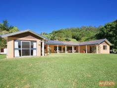 311 Cooroy Belli Creek Road, Cooroy QLD 4563 Breathtaking views of rolling green hills. Low maintenance family home with dual living possibility. Cooroy township only 5 mins away. Your chance to live the dream. This is your opportunity to have it all!! 10 stunning acres where you can grow your own veggies and fruit, have a pony and even run a few head of cattle. Everything is set up and ready to go so all you have to do is move in and enjoy!! Set in a majestic, elevated position, this comfortable family home features a floor plan that is ideal for those of you who work from home or live in a dual family situation. Cool tiles extend throughout the living areas and the huge, country kitchen features solid Tassie Oak kitchen cupboards. The main bedroom is huge and allows wonderful views of rolling green hills. The second bedroom is fit for a queen with a spacious dressing room and lots of cupboards. The tranquillity and beauty of country living is never to be enjoyed more than when you are relaxing either under one of the magnificent trees in this beautiful garden or when you are sitting under the covered entertainment area.