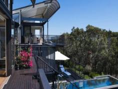 35-37 One Mile Close Boat Harbour NSW 2316
Set on two separate blocks just two hours from Sydney, this exclusive
Boat Harbour hideaway is flanked by National Park. Conceived as a pair
of interconnecting, Eco sensitive pavilions, the house has an elegant
design and exquisite indoor and outdoor living areas, all with a
breathtaking northerly outlook across bush, beach and bay.
Three gorgeous bedrooms, the luxurious master set in its own
pavilion, open plan living and dining with fireplace, family or billiard
room, stunning kitchen with Caesar Stone bench tops and European
appliances, divine bathrooms, "infinite edge" lap pool and cascade,
extensive native gardens, polished timber floors, abundant light and
triple garaging.