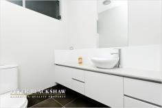 216 B La Perouse Street, Red Hill, ACT 2603 Sleek and Stylish A great opportunity has arisen to purchase in the sought after suburb of Red Hill. This newly built stunning townhouse is perfect for living in style, with a fashionable design and modern luxuries. The property supports the highest quality appointments, including a gourmet kitchen featuring stainless steel Miele appliances, Caesar stone bench tops, butler’s pantry, beautifully presented bathrooms, security system and intercom. The residence is light and airy with plenty of windows offering an open plan lifestyle, and two private court yards, one internal and one at the rear. The large master bedroom, walk in robe, ensuite and private deck are situated on the ground floor as well as the study. Upstairs consists of bedrooms two, three and four both and the main bathroom. Only minutes from Manuka and Kingston Centres, the Parliamentary Triangle and the lake foreshores this townhouse is perfection! Features: • 4 bedrooms • 2 bathrooms plus powder room • Study • Internal court yard • External courtyard • Solar hot water with gas booster • Double Glazed windows • Reverse cycle air conditioning in master bedroom and living rooms • Insulated concrete forms • Timber flooring in living areas and hallway • Carpet in bedrooms • Double lock up garage with internal access • Miele appliances • Caesar stone bench tops in kitchen, bathrooms, laundry and workshop • Intercom and security system • Grassed lawn to the rear • Foxtel connection • Prevision for NBN • In ground water tank 3,000 litres