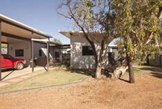 4 Nauclea Way Kununurra WA 6743 Then we have the home for you. This 4 bedroom 2 bathroom eco home is split into two 2 bedroom 1 bathroom homes separated by a large outdoor living area. The main unit has a functional kitchen and dining area, 2 good sized bedrooms and a good sized bathroom. The other unit also has 2 good sized bedrooms, bathroom, a kitchenette and lounge area. All bedrooms and living areas have split system air conditioners and down lighting. The outdoor living area has a basin and kitchenette potential. The yard is of good size and offer a front fence section to keep your pets at bay. Double carport and natural Kimberley inspired garden surround the property and let you relax outside in comfort. With only 4 months remaining on this lease, get in now to secure this property for yourself before lease negotiations begin or purchase as an investment with the properties strong investment potential.