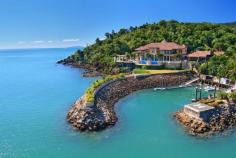 Mandalay Road Airlie Beach QLD 4802 6 king-sized en-suited bedrooms Fully self-contained staff quarters Private 24m berth marina & personal helipad 10 mins from Hamilton Island jet airport Humidity controlled cellar & dining hall State-of-the-art theatre & games room Immaculately landscaped grounds Stunning pool & outdoor terracing Spectacular Coral Sea water frontage Enjoy the very best of the Great Barrier Reef