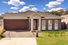 11 Tussock Street Ropes Crossing NSW 2760 Beautifully presented in a quiet street position offering lovely district views from your peaceful yard, this wonderful single level family home delivers elegant living at its best. Loaded with stunning features including open plan living space with high ceilings, classy gas kitchen with sand stone benches, island sink and large 5 burner gas cooker & 900mm oven, four large bedrooms including a master with walk-in robe and private ensuite bathroom, spacious main bathroom, roomy laundry, ducted air-conditioning, a sensational large theatre room ,a romantic warm gas fire heater and a superb manicured alfresco and garden area with external Natural gas connection to enjoy outdoor dining with family and friends. Add to this an extra double lock-up garage with internal access and remote entry plus space for an extra car off-street, just 2 minutes to Ropes crossing Marketplace and transport and you've got the perfect home in the perfect location.