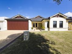 107 Sundowner Meander Banksia Grove WA 6031. Prepare to be wowed by this beautiful family home. Ticking all
the boxes, this house is perfect for anyone looking to settle in a
convenient and quiet location. Built in 2009 and set on a 569sqm block;
this spacious property has it all. Featuring, a master bedroom
with his & hers walk in robe, elegant feature wall, and a modern
double vanity ensuite. 3 double bedrooms with built in robes, beautiful
main bathroom with shower, bath and enclosed toilet. You can also
tick off your list, a large open living area, spacious casual meals
area, open plan kitchen with plenty of cupboards and bench top space,
dishwasher and a great walk in pantry. Including, Separate dining room,
ducted evaporative air-conditioning system, and ample space for large
furnishings and comfort through out the home. Inside floors for living and wet areas are tiled and easy to clean, while the bedrooms and lounge have plush carpet. Outside
boasts a large tidy yard, including, a good size alfresco, low
maintenance grass area, an in-ground fibreglass, salt water swimming
pool, with solar blanket and creepy crawler – Fantastic for entertaining
family and friends! With a home so spacious and plentiful; the list goes on... • A great family layout with soft neutral walls and quality fittings • Easy to clean laundry, linen cupboard • Grass area for pets • Low maintenance reticulated gardens • Double lockup garage with side-back access and shoppers entry • Alarm system • Fully insulated • Quiet Street • Only a short distance away from bus stops, shops, parks and schools. Get in quick, at this price, this gem won’t last.