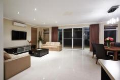 207 Gaebler Road,
AUBIN GROVE WA 6164 Closing date Sale 11 August 2014 by 5 pm. The Sellers reserve the right
to sell prior. They have bought elsewhere and need to move this
magnificent home HAS IT ALL where family living and fabulous
entertainment zones blend seamlessly together. Ideal also for extra
parking a boat or caravan with enclosed side access plus large lockup
garage and roller door to the backyard, Contemporary design and
ultimate entertainer full of extras and additions to maximise every
aspect. Ideally situated a short stroll to the local shops, Aubin Grove
primary school, nearby parklands, and transport at Lyon Road. Boasting
a corner garage this connects to a masterfully built outdoor kitchen
(man cave) with built in oven, barbecue, high spec sink, tap ware and
built in cupboards. The indoor kitchen provides banks of cupboards,
central island bench, twin draw dishwasher, under bench oven and range
hood, the master chef tap ware will impress. High ceilings in the open
plan living area is a WOW factor. Separate Theatre room, . Step out to
the Dome Patio to a fabulous backyard were the children and pets have
room to play, or space for a pool. Extensive exposed aggregate pathways
and paving. King side Master suite, his/ her robes, ensuite with twin vanity and bath. Spacious minor bedrooms with built in robes and a study. The laundry has plenty of built in cabinetry, storage and the bathroom is conveniently located. 4 Split system reverse cycle air conditioners. Gas Point Twin draw dishwasher Gas hot plates and hot water system Solar Panels Porcelain tiled floors to living areas and carpet to bedrooms. Quality window treatments, drapes, fixtures and abundance of down lights and feature lighting. Security flyscreen front door and sliding doors to patio.