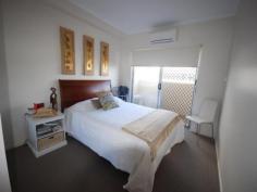 230 MELTON ROAD Nundah QLD 4012 This unit is located in a secure gated complex at Moda Melton This property offers you the following: Large open plan tiled living area 6m by 7m Air Conditioned Modern kitchen with pantry, integrated dishwasher, ceramic cook top and range hood Microwave cubby 2 pak cabinetry in silver with granite bench tops Breakfast bar and plenty of cupboards Large 20m2 entertaining balcony facing North directly off the living area Security screens and doors Hallway with a full wall of storage cupboards Master bedroom is Air Conditioned Walk in robe Ensuited bathroom Balcony off the bedroom with security screen doors Second bedroom has built in robes Opens to rear balcony with security screen doors The main bathroom is huge with bath/shower Vanity and toilet Laundry has a wall mounted clothes dryer Completing the picture is a secure basement car space with internal access to your stairwell Intercom access to stairwells Secure front gate to the complex The complex has 24/7 onsite experienced managers In ground resort style pool with spa and BBQ Large green space PET FRIENDLY - under 10kgs no Body Corp approval is required for your pet 3 x Car wash bays NBN installed Foxtel capability Close to Centro Toombul shopping centre 1km 5 minute walk to Nundah Train Station 10 minutes to the Brisbane airport 8kms to the CBD Schools and day care within a few minutes of the complex This unit is currently tenanted at $450 per week until 31st January 2015 Add this great unit to your portfolio or enjoy the lifestyle by living here yourself at Moda Melton