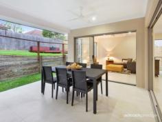 44 Dell Rd St Lucia QLD 4067 A truly superlative locale that is quiet and leafy, yet is within 200m
of the University of Queensland, brings a central advantage to this
newly completed contemporary residence. Built over two meticulously
finished levels, the well designed home incorporates open plan living,
alfresco spaces and a relaxed liveability that is well suited to a low
maintenance lifestyle.
Indoors and out, neutral finishes bring timeless appeal, while quality
fittings and fixtures, including Caesarstone bench tops and timber
veneer cabinetry all contribute to the polished, sophisticated feel.
Additionally, a judicious use of both translucent glass and high-set
windows ensures maximum light and natural airflow throughout the home,
without compromising privacy.
Surrounded by space for living and dining, the streamlined kitchen makes
a strong style statement in the main living area, with rich mocha
tones, stainless steel appliances, plentiful cabinetry and a walk-in
pantry. Stacking doors allows for easy integration with the outdoor
living room, while the adjacent media zone brings a separate space for
more sedentary pursuits.
Upstairs, four large bedrooms all have integrated wardrobes, with the
main suite making use of a walk-in wardrobe and a spacious ensuite
complete with dual, above-counter basins and a separate toilet. There is
a secondary living space on this upper level - ideal for children or as
a casual lounge, while a powder room, study, air-conditioning and dual
car garage completes the detailed offering. Outside, the easy-care yard
brings a secluded space to relax, with tidy gardens, a patch of green
lawn and a timber sundeck for lazing about.
Along with being so close to the University, the home has the best of St
Lucia right on the doorstep with shops, parkland and eateries all
within a short walk and every additional amenity within a few minutes
drive.