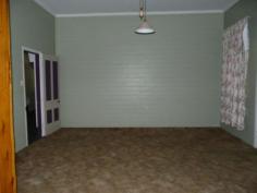 96 Ann Street Mitchell QLD 4465 QUEENSLANDER - CLOSE TO MAIN AMENETIES 3 Bedrooms (2 built-ins), Lounge/Dining, 2-way Bathroom, renovated Kitchen, Laundry area, Verandahs. Split-system air-conditioners, Fireplace. 2 bay Garage, 3 bay Carport, plus 2 concrete bays. Fenced 1841m2 block with access front & rear. Close to Hospital, Park, Shopping & Sports. General Features Property Type: House Bedrooms: 3 Bathrooms: 1 Land Size: 1841 m² (approx) Price per m²: $152 Indoor Features Air Conditioning Outdoor Features Carport Spaces: 3 Garage Spaces: 2 Eco Friendly Features EER (Energy Efficiency Rating): Low (0.0) Other Features Deck