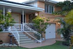 SOUTHPORT, QLD, 4215 Set in the prestigious TSS precinct surrounded by multi-million dollar properties and the added bonus of the sandy river front beach and park less than 100mts away. Front balcony facing North, this immaculate 3 bedroom home has been beautifully renovated, sleek & stylish kitchen with stone & glass finishes, wide fridge space and window as servery to the back outdoor entertaining area. One bathroom and toilet upstairs, plus shower and toilet downstairs. Double remote garage with workshop could easily be converted to more bedrooms and living zones, with land out front for double carport and pool.. scope to add value to this solid home. The building frame is termite resistant Cypress Pine. Thousands of dollars spent on features, including the stunning white shutters throughout, crime safe on all the windows and doors, spear pump + solar panels. Walk to Gold Coast Arts & cinema complex, vibrant shopping and dining, Gold Coast Turf Club, golf club and surf beach. This home is well worth your inspection. Call now to arrange viewing.