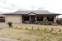 DALBY
ID # 117708743
11 Glen Eagles Drive This quality home built in 2008 with exceptional street appeal,
excellent pier & beam foundations and within metres from the 15th
fairway. Dalby's Golf course is a 18 hole golf course with a Club house
which has full bar and catering facilities. The home is
outstanding in design with 9 foot ceiling, tiled throughout except for
the 4 bedrooms + office. The main bedroom has walk-in robe ensuite and
separate toilet. The kitchen has a central position overlooking the open
plan living: boasting breakfast bar stainless steel appliances
dishwasher and plenty of cupboard space. You will also love the
enormous rear covered deck and roomy North Facing front verandah for
entertaining. Car accommodation is well catered for with attached double
garage featuring automatic panel lift door and a detached 6 x6 metre
color-bond shed with power & concreted floor. There is even a
separate room for the GOLF BUGGY with its own roller door and easy
access to power to charge the batteries up for the next round of golf.