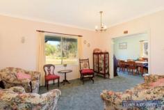 13 stringy bark ridge road armidale NSW 2350 Perfectly located is this small rural holding with sealed road access to
the University City of Armidale . On offer is approximately 35 acres
which is currently run as a stud Angora Mohair goat enterprise. There
are numerous stand out features of this property, they include; - 4 bedroom brick veneer home, main bedroom with ensuite. - Multiple living areas through out the home with wood heating. - Large timber kitchen with a great Northern outlook and timber verandah. - Solar hot water system and back to grid solar panels. - 6 Bay colourbond shed with workshop areas with fully equipped single stand shearing shed. - Separate toilet and shower off workshop area. - Ample water storage, 5 x 25,000 litre tanks, 3 dams, plus creek frontage. - Fenced into 5 paddocks with good shelter breaks. - Established goat/sheep/alpaca yards and loading race. To view this exceptional property contact Michael Singleton on 0434714788 today for further information.