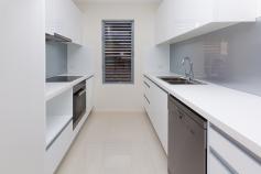 5/31 Palmer Street, Greenslopes Top floor apartment 3.3m high ceilings with fantastic district views. With a contemporary design in a fantastic location, this apartment checks all the boxes when you are seeking a near new luxury apartment which offers great space and flexible living. Upon entering this spacious 2 bedroom apartment you will be pleasantly surprised by the open plan, quality finisher's and abundance of natural light with 3.3m ceilings Cleverly designed gourmet kitchen, featuring Miele stainless steel appliances, stone bench tops, all ideally suited for entertaining. Greenslopes is a well positioned suburb just 6 .3km South of the Brisbane CBD and provides residents with outstanding amenities and a fantastic suburban lifestyle. This apartment has incredibly central location in a quiet cul-de-sac in a leafy setting. With easy access to the M1, excellent schooling options, Griffith University Campuses at Nathan and Mt Gravatt, Greenslopes Private Hospital, Greenslopes Mall, Westfield Garden City and Westfield Carindale - everything really is on your doorstep! Siting pride of place on the top floor of this boutique complex of eight apartments, it features many fantastic inclusions: - Apartment is on the top floor, with 3.3m high ceiling and receives abundant natural light - Fully tiled living and dining - Large North east facing covered balcony with a sensational uninterrupted district views - Modern kitchen complete with Miele Stainless steel appliances, stone bench tops, two-pac cabinetry with soft close doors and draws - 2 good sized separated bedrooms with built-in wardrobes and easy bathroom access - Master bedroom has an ensuite , walk in robe and direct balcony access - Air-conditioned living areas - video intercom - Storage cage in secure garage Stylish, spacious and convenient - this apartment ticks all the boxes. Don't miss your chance to own one of the best apartments in Greenslopes. This unique apartment will not last long at this price! Call NOW to arrange your inspection