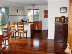 49 Anne Collins Crescent Mundoolun QLD 4285 True Country Living On 7 Acres Final Reduction - Now Only $725,000 A great big sprawling Queensland Colonial with views to Tamborine that really has it all – and is only 3 years old. The
7 acres that the home sits on is divided into 5 paddocks (3 large &
2 small), and has 3 Sheds, a dam, an animal shelter/shed, chook house,
and quality fencing (some even dog proof). The home has 4 country sized bedrooms, 2 bathrooms and has verandah’s front and back to take in the truly outstanding views. On
entering the home you are met with a massive dual living area with 12’
vaulted ceilings, polished floors, ironbark feature posts, a pot bellied
stove especially designed for providing central heating. The vaulted
ceilings extend through to the great entertainment area on the back
veranda. This home has so much space it will take BIG Furniture. Adjoining
the living area is a massive country kitchen with quality all the way.
Beautiful rare granite bench tops with timber doors, a Fisher &
Paykel induction stovetop,& oven as well as a Kleenmaid dishwasher. You’ll
appreciate the 9’ceilings throughout the rest of the home especially in
the four bedrooms as it makes for a very cool & spacious living as
one should expect. This home although modern and almost new has a
wonderful old-fashioned country ‘feel’ about it. This family
residence also hosts a fully functional granny flat (or guest wing) with
its own living area, kitchen, bedroom and (3rd) bathroom. The home also boasts ‘Crimsafe’ security screens on all the windows and doors. There
is a massive storage area under the home big enough for trailers, boat,
ride-on mower, and equipment. Much of this space is concreted. This is genuine a working rural property at its finest...Live the Dream! CLICK ON ANY PICTURE TO ENLARGE Situated
in ‘The Mundoolun Estate’ that has Over 300 Acres purely dedicated to
Wildlife Corridors and Parklands, and is well known for its quality of
housing. Each Acreage Property has Town Water, Underground Power &
Phone, and Tree lined Kerb & Channelled roads. Just a short drive
to the thriving Jimboomba town centre; there you’ll find a fine array
of Shops & Café’s including Woolworth’s, Coles, Bakers Delight,
Mitre 10, the Post Office, Takeaways and much much more. Only 45 minutes
to both Brisbane and the Coast. A copy of the “Sustainability
Declaration Statement” for this property can be viewed at our office
situated at lot 1 John Collins Drive, Mundoolun. Please call (07) 5546
9093 for our office hours. For an inspection please call (07) 5546 9093 Property Information Area: 7 Acres Bedrooms: 5 Bathrooms: 3 Garage Spaces: 4
