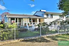 38 Hill Parade, CLONTARF QLD 4019 The largest family can spread out here! Split-level brick & tile on 860m2 corner block. Four bedrooms plus study. Polished timber floors. Formal lounge & dining. Breakfast nook. Ducted air-con. Super size master bedroom. Fully self-contained granny flat or large rumpus. Wine cellar or storage area. Separate workshop. BBQ patio plus two other outdoor living areas. Tradesmen will love the extra large double garage. Great neighbourhood. Park at the end of the street. Walkway through to schools and beach.