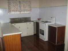 17 Queen Street Dallarnil QLD 4621 File 2986. Delightful 3 Bedroom Low Set Fibro Cottage in the small Country Township of Dallarnil on 1/2 acre block of land. A short walk to the Primary School & Local Store. Situated in a lovely Quiet part of Town app 25 minutes to Historic Childers & a further 10 minutes to Country Township of Biggenden. This lovely Cottage has recently been renovated & has been freshly painted throughout. * 3 Bedrooms. 2 With Built in Cupboards. * Polished Timber Floors Throughout. * Open Plan Dining/Kitchen/Lounge. * Bath with Shower over head & Basin. * Separate Toilet. * Built in Linen Cupboard. * Kitchen with Breakfast Bar & Electric Stove. * Front Verandah & Rear Deck. * 5,000 Gals Rain Water Tank & Fenced on 2 1/2 Sides.