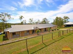 70-74 William Humphreys Dr Mundoolun QLD 4285 SERIOUSLY DISCOUNTED!! FAMILY HOME ON ACERAGE WITH MASSIVE SHED Sale Price: $479,000 4 Bedroom Home + Huge Outdoor Entertainment + Acreage + Industrial Shed + Views + Usable Land + Parkland/wildlife neighbours. Complete Replacement Value: $615,000...Seriously!! THE HOUSE: There is a lot packed into this 274.2m2 (29.5sq.) Baroness 274 Coral home. Apart from being solidly constructed, it is superbly located on “Millionaires Row”.....aptly named because of the million dollar views and surrounding homes in the magnificent Mundoolun Estate. With a perfect north–south facing aspect it adjoins acres of parkland and has views front and rear across the Tamborine Mountain ranges. The home has four internal living areas with the Entertainers Kitchen being the central hub of the home. The generous master bedroom features an en-suite with spa bath, and a walk in robe. Mum and Dad have their own space and are totally separate from the guest & children’s bedrooms. LET’S TALK KITCHEN: All European appliances. Stainless Steel ducted hood above a Blanco Gas Stovetop. Blanco Electric Oven. Brand new Haier Dishwasher. This kitchen is well designed with generous bench space and two pantries. Gas hot-water. HOW ABOUT THAT ENTERTAINMENT AREA? : Approx 10m x 4.5 m under a solid Stratco roof. Dine, lounge or entertain whilst taking in the magnificent views or a spectacular sunrise. Fantastic! A ‘REAL’ MAN CAVE: The huge TITAN industrial shed has a centre gantry (the boys will appreciate this), great lighting, power & rainwater tank. It was constructed to house 4 large American Cadillac’s plus a workbench/space area. PROPERTY OVERVIEW: Situated on 4605m2 with all usable land fully fenced. A very family friendly property. Gardens fully established and recently topped with red cypress mulch; very easy to maintain. In total parking for 6 + Australian cars. COME ON DOWN: View this property by appointment. Ph: (07) 5546 9093 Property Information Area: 4604 Square Meters Bedrooms: 4 Bathrooms: 2 Garage Spaces: 6