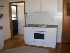 21 CORCORAN ST, Berrigan AREA: 2017.0m2
LOCATION: 21 Corcoran St Berrigan, is close to schools and all town amenities, rear lane access into second enclosed back yard
This comfortable family home is well located. An easy walk to town.
With its 9 ft. ceilings, polished timber floors in the living areas,
carpeted hallway and bedrooms and quality blinds and curtains
throughout, it is waiting for you to include your personal touch to it.
Some of the many features include:
* KITCHEN: Walk-in pantry, dish washer, electric stove with range hood, breakfast bar, lots of cupboards.
* BATHROOM: Bath, glass shower, vanity, tiled floor. SEPARATE TOILET.
* THREE LARGE BEDROOMS: All with spacious wardrobes and decorative practical timber shelving
* LAUNDRY: Good sized with linen cupboard and tub.
* LARGE LINEN CUPBOARD in carpeted hallway, adjacent to bedrooms and bathroom
MASSIVE GRASSED AND EASY CARE BACK YARD, safely fenced for children and pets.
A 6 m x 12 m SHED WITH CONCRETE FLOOR, CUPBOARD SPACE AND SHELVING - AND POWER. GARDEN SHEDS
Another fully fenced graveled yard area accessible from rear laneway, divided from back yard by secure fencing.
A QUALITY HOME IN QUIET STREET
ASKING $172,000.00 NEG