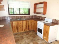 VALLA, NSW 2448 FOR SALE $410,000
This cute loft style cottage is on a magic block of land in
the ever popular Valla rural sector. A creek meanders through the
property & the grounds are near level. Privacy is absolute with a
stands of mature trees dotted along the boundaries & there is a shed
with 3 phase power on the upper section near the front of the property.
There's plenty of room for vehicles with double carport & extra
storage. This is a perfect place for quiet relaxtion just 7 minutes
drive to Valla Beach.