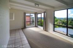 20 Kingsview Dr Flaxton QLD 4560 With
a perfect north-east aspect, this easy care brick home offers views
over the hinterland towards Noosa environs. Well positioned in a garden
setting on 985m2 in a quiet cul-de-sac situated minutes from Montville
and Mapleton with easy access to Nambour and the coast, this property
represents a fantastic opportunity as a family home or rental
investment. The central lounge room features raked ceilings and a
wood fire for cozy winter warmth. The dining area is located next to
the sunny kitchen and is partially open to the family room. The living rooms plus the main bedroom open onto the private rear deck where the views may be enjoyed. There are three bedrooms - two with built-in robes - adjacent to the fully refurbished, modern bathroom with separate WC. A
1.5 bay Colorbond lock-up shed is located on a separate driveway to the
double carport providing plenty of car and workshop or storage space. Two
rainwater tanks provide plentiful water for the home and another
provides water for the established gardens in the fully fenced, easy
care back yard. Currently tenanted with a good return on
investment, there is potential to further develop the home and
capitalize on the position and reap the rewards. This property is well priced and great value, call now to make your appointment to inspect. Features Fenced Smoke Alarms Verandah Safety Switch Property Details Property Type: House Bedrooms: 3 Bathrooms: 1 Garages: 2 Land Area: 985m2