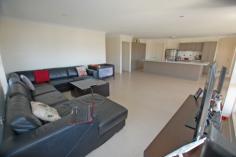 Ritz Drive Coomera QLD 4209 ~~This home is tenanted until August 2015, the best part is these wonderful tenants look after the property as if it were their own, making this an even better investment. Walking distance to primary school, shops, transport, with a short drive to theme parks, major shopping and freeway. Featuring: *4 spacious Bedrooms *2 Bathrooms, Master with Ensuite *Large tiled open plan Living *Spacious Lounge and Dining Areas *Modern Kitchen with dishwasher *Air Conditioning *Fans to Bedrooms *Outdoor entertaing area *Double lock up garage with internal entry *Good size Yard for children to play *Water Tank *Handy Location
