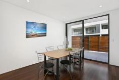 8/23 Myrtle Street Botany NSW 2019 Stunning New Townhouse This brand new North facing contemporary 3 level townhouse is sure to impress, sumptuously finished in a crisp contemporary style, creating a new benchmark for Botany. Located in one of Botany's finest streets opposite the world famous greens of Sydney's elite Lakes golf club, this executive family retreat offers both unequaled luxury and quality design and detail. Move straight in and enjoy this remarkable home. Ground Floor: *Gourmet stone kitchen with delux Smeg Gas cooking and dishwasher *Separate lounge and dining areas both leading to entertainers courtyards *Fully ducted Air-conditioning throughout *Polished floorboards throughout *Guest w/c, internal laundry and direct access to double parking facility First Floor: *2 Large bedrooms with built-ins and balconies *Stunning designer full main bathroom *Study/Media Room perfect for the kids Top Floor: *Master main bedroom of expansive proportions *Master en-suite *Huge Master twin balconies with great cross ventilation A total of 249sqm on title and positioned directly opposite the exclusive Lakes Golfcourse, 50 metres from Botany Aquatic Centre and Booralee Park.