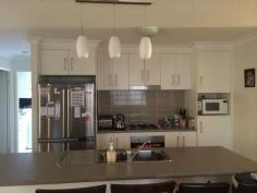 274 Goombungee Road Harlaxton Qld 4350 Near new 4 bedroom home featuring master bedroom with walk in robe and ensuite. There is a large island bench with breakfast bar in the kitchen which is centrally located for all your family to gather around at meal times. The family and living areas are fully tiled and feature a reverse cycle air conditioner. Relax in the alfresco living area while entertaining friends or enjoying a quiet BBQ. There is room for the kids play equipment plus two large rainwater tanks and a lock up shed near the laundry, providing plenty of storage for your lawn mower and golf clubs. This home has been built on a large 670m2 block to capture the north easterly aspect and enjoys beautiful sunsets from being highly elevated featuring magnificent rural views. This home could rent for $380 - $390 per week. All this only a short drive to the new Northpoint Shopping Centre.