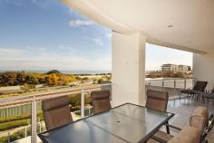 5/9 O'Connor Close NORTH COOGEE, WA 6163 Very classy two bedroom apartment in a central position in the Oceans Edge Apartments with panoramic ocean views towards all three islands. Enjoy the amazing views from your bedrooms as well as from the lounge and kitchen. Both bedrooms and the lounge will give you access to the large curved balcony. From here you have uninterrupted views from Garden Island to the entrance of Fremantle Habour and to the in-house pool below. Both bedrooms are well appointed with built-in robes and quality carpets. Both bath rooms offer spacious showers and come with classy finishes. The central kitchen is well appointed with the latest appliances overlooking the timber floored living area. There is a separate study and a well equipped separate laundry. This apartment comes with excellent security, store room and under cover parking for two. The beach access is only a few meters down the road. Start your South Beach lifestyle today and call FRANK SANDER now on 0411 1234 77.