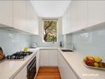12/2 Pearson St Balmain East NSW 2041 ith spectacular 180-degree views of the harbour, the harbour bridge,
Barrangaroo parkland and the city skyline, this superbly renovated
apartment is on the first level of Midships, a boutique low-rise complex
set amid gracious period homes in a quiet tree-lined avenue at the tip
of Balmain East peninsular.
Ideally located, the building is footsteps from the harbour foreshore,
expansive tracts of parkland and Balmain East ferry and CBD buses, as
well as a short walk from village shops and cafes on Darling Street
Architecturally redesigned with premium quality fixtures and finishes
throughout including Tallowwood floors, integrated cabinetry and
bookshelves
Central entrance hall flows to light-filled living and dining zone with
wide picture window and glass door opening to private and sunny view
balcony
Sleek Quantum Quartz gas kitchen with abundant storage (including self
closing drawers), Liebherr integrated fridge and NEFF appliances
including four-burner gas cooktop, electric oven (with slide away door
and steamer), rangehood and integrated dishwasher
Main bedroom with generous custom-built-in wardrobe, designer
single-blade ceiling fan, bespoke curtains and glass door opening to
view balcony
Second double bedroom with built-in wardrobe, custom fitted shoe cupboard and Roman blind
Chic and spacious Carrara marble bathroom with big shower, heated towel rail and concealed laundry with linen storage