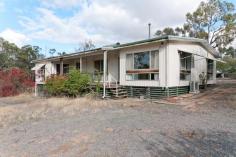 BAKERS HILL
HOMEWORK TIME! SUBDIVISION POSSIBILITIES...
You may need to do a little 'homework'
on this property, it is ideally located and could be a good investment
or your new home. It is 9324sqm (nearly 2 and a half acres) and did
have WAPC planning approval to divide into six lots (this approval
expired in December 2012, but may be able to be renewed). Located
in a great spot, near the Bakers Hill town and across the road from the
Primary School. So ideal for families with young children. The
home has some character and is spacious with four bedrooms, two
bathrooms and two living areas, with good air conditioning for the
summer months. Outside there is a screened in patio area and a double garage. > 4 x 2 Fibro Home > Two Living Areas > 9324sqm (nearly 2 and a half Acres) > Possibility of Subdivision > Lock Up Shed/Dble Garage > Close To All Amenities