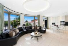 9 The Little Grand Parade BRIGHTON-LE-SANDS NSW 2216 A Unique master built statement. This prestige luxury residence is an architectural masterpiece and located on a waterfront position known as, (The Little Grand Parade) on the shores of Botany Bay with uninterrupted panoramic water views and set on a parcel of land in total area of 870m2. The residence offers easily accessible beachfront lifestyle with a short stroll to Brighton-Le-Sands beachfront lifestyle Cafe's, restaurant's moments away and easy access to the city, domestic and international airport. First time offered, this unique prestige property is more than just a residence. It was cleverly designed with 180 degree water views across Botany Bay with huge curved glasses windows for natural light filtering through out and large open plan living and entertaining areas. The residence is a three level property and offers six over sized bedrooms, all with en-suits, polished floorboards, and access to the balconies with one of the bedroom been located on the ground level. Two large living areas, a separate study area, media room, large theatre/rumpus room, an internal lift and a majestic staircase. All living areas with granite floors and imported purified floor tiles. A polyurethane kitchen with European stainless steel appliances, granite splash backs and bench tops. Ducted split system air-conditioning, gas heating and cooking facilities. An in ground heated pool and spa, entertaining BBQ area, and a council approved granny flat at rear of the property been 68m2. This is a once -in-a lifetime opportunity to purchase this remarkably world class prestige residence.