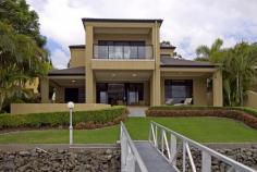 5258 Marine Dr N Hope Island QLD 4212 An exceptionally well maintained 2 level family home built by Martin
Fiebig.. Around 50 squares including 4 king size bedrooms with spacious
ensuites. The master suite has a private balcony, luxurious ensuite and a
very large walk in robe/dressing room.open plan formal living areas
including a large full wet bar with matching granite benchtops as the
stunning kitchen . Bi-folds extend to a sun drenched entertaining area
including tiled inground pool. . The study has a full wall of built in
storage and shelving. Large entry foyer, powder room, double garage plus
separate buggy garaging with access to the home, and low maintenance
gardens – nothing needs to be spent on this one – it’s all here.
Overseas vendors – make an offer!