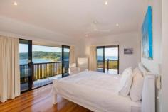 Whitsunday Blvd Whitsunday Islands National Park, Hamilton Island QLD 4803 This stunning low maintenance property features outstanding 180 degree sea and island views, overlooking Whitsunday Island to the east, through to Whitsunday Passage and South Molle Island to the west. The property also features a 5 bedroom, 3.5 bathroom house designed by Chris Beckingham, is fully furnished & air-conditioned, with in ground wet edge pool and spacious verandahs and patios ideal for entertaining, all surrounded by landscaped tropical gardens and established quality properties