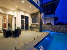 Sovereign Islands 5 bedroom luxury uniquely elevated to create a floating modern home
• State of the art Smeg kitchen, double oven, butler’s pantry, Caesarstone
• High quality - endless glass, Blackbutt timber, bi-fold doors, open plan
• Luxury master suite features spa, rain shower, deluxe robe, dual vanity
• Theatre purpose built with 3 tiers of seating, Breathtaking ‘glass’ office
• 2009 HIA award winner, triple garage, 23 tonne concrete pontoon berth