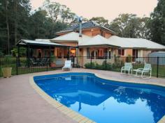 49 The Basin Road St Georges Basin NSW 2540
Just a 300metre walk from the tranquil waterways of St Georges Basin,
is this impressive 292m2 modern architecture designed Tri-Level home
consisting of 4 bedrooms 2 bathroom and double garage! Nestled on 2
acres the home has been strategically positioned 150metres from the
roadside to provide seclusion and privacy from the outside world.
This master built quality open plan home has a unique design to
create maximum space, capture natural light and has many standout
features that are visually appealing and yet is practical.
Starting with the custom made lead-light entry doors, reflecting
the natural bush setting , the high pitched ceilings with laminated
exposed beams, German designed hanging glass open fire place, sunken
lounge room, glass bricks wall entry, reverse cycle air conditioning
right up to the third tier lofted master bedroom with parents retreat.
There is even a built in room ready to convert to a cellar!
The kitchen, dining, lounge and living rooms have clear views and
ease of access to the grassy backyard, pergola area and adjacent in
ground pool convenient when entertaining or for watching the beautiful
abundant native bird life, perfect for keeping a watchful eye on the
children.
This amazing property is just a short drive to country club, golf
course, boat ramps, pubs, shops, cafes and approximately 35 minutes to
historic township of Berry and 2.5hours to Sydney.
Sale Details
$775,250