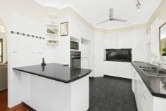 11 Humbert St Leanyer NT 0812 Situated in the highly sought after suburb of Leanyer and in one of the best streets, this spacious four bedroom, two bathroom, elevated home will suit a buyer looking for “that special†home. This property features polished floors throughout and a recently refurbished kitchen. The upstairs bathroom is of a modern design and has both separate shower and a lovely spa type bath set to one side. All of the upstairs bedrooms have built in robes and split air conditioners, complimented by those polished jarrah floors, that just give you that cool , tropical feel when you move around the house. There is a beautiful front balcony which overlooks the front garden and the street. Downstairs the fourth bedroom is self contained, with its own, very well presented bathroom and kitchenette. This part of the home is being rented out on a week by week basis for $340 per week. The block is a substantial size at 811 square metres. In the back garden is a large pool with a great shade sail and a separate spa that has its own, balinese style gazebo. There is a substantial lawned area for children to enjoy their play. Priced at a very reasonable $695,000. This one is an obvious, value for money, purchase in one of Darwin’s best suburbs.