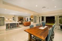 6 Rowan St Mona Vale NSW 2103 Blending modern luxury with sophisticated elegance, this near new custom built home offers a rare and uncompromising beachside lifestyle. Situated on a parcel of 1012sqm, with a perfect sun drenched North facing aspect enjoying outstanding privacy, impressive entertaining and warm hearted living. * Meticulous construction coupled with premium appointments throughout, make this home a very rare find * No expense has been spared on the quality of finishes ensuring you are well catered for with comfort, luxury and style * The impressive kitchen boasts Miele appliances including, 7 burner gas stove, self cleaning and misting oven and the added luxury of a plate and food warmer * Offering five generous bedrooms all with built in robes, including two master suites both with ensuites and large walk in wardrobes * In addition to the two ensuites you have a powder room, separate WC and the main bathroom that includes a spa bath * Separate living and dining spaces flow through bi-fold doors to the covered outdoor entertaining area complete with stunning French pattern travertine stone floor * High ceilings throughout give you a sense of space and granduer * Separate sunken lounge / cinema room / sitting room * Surround sound piped throughout the home and zoned * Reverse cycle air conditioning throughout that is also zoned * Cedar Plantation shutters and solid cedar front door * Back to base alarm system that can be zoned