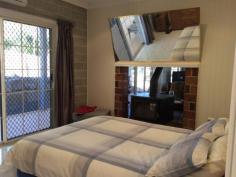 10 Braeside Ct Boonah QLD 4310 Inspections Inspections by appointment only. This
2 bedroom home is located in a exclusive estate in Boonah. On an acre
and a half it feels like you are living in the country with the
convenience of being in town. The home has been designed with 'living'
in mind. The bedrooms are extra large with the main bedroom having a two
way fireplace. Huge living area with glass sliding doors cleverly
placed so wherever you sit you have views to the countryside. Wrap
around verandah and huge carport. Nothing to do here move in and enjoy
the view. Priced well with other homes in the estate being double the
price to buy. Get in quick, first to view will buy it.