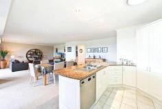 Caves Beach, NSW 2281 One of only a couple of
beachfront reserve apartment options available in Caves Beach, this
property distinguishes itself from the others in a big way. Offering
features far superior to its neighbours, in terms of bigger apartment
size, bigger garaging options and genuine ocean views with direct beach
access not available in the bigger apartment options set back from the
beach. Set in a more intimate group of only 5 apartments, this
property boasts the only internally accessed 2 car remote entry garage.
The current owners have their boat, car and plenty of shelving and
stored items comfortably arranged inside. The apartment itself
features generous, softly down-lit open plan living that flows off the
entry and out to an extremely large, covered outdoor living area. The
minute you walk inside you are taken aback by the unexpected
spaciousness of the living and also the delightful outlook to beachfront
shrubbery and ocean views. Spot the whales or count the ships and enjoy spectacular sunrises and amazing Nor Easterly breezes all summer long. The
living flows off the top end, quality, 2 pack and granite designer
kitchen, which is complete with not only an outlook to the living areas,
both inside and out but also the ocean view. The internal living
offers large dining and large lounge options with 2 sets of big stacker
doors connecting the living to the oversized, outdoor living and the
ocean view. A genuine, separate laundry also opens out to the deck and is complete with a very handy second toilet. The
deck boasts room for both outdoor lounge and dining options with a tap,
power and lighting all provided for extended easy all seasons
indoor/outdoor living. Back inside discover 2 king size bedrooms both
complete with generous built in wardrobes and easy access to the
oversized bathroom with a feature large heat pump spa and separate
shower. Every surface is like new with tradesmen quality paintwork
throughout, gorgeous new carpets right through and quality shicane
blinds throughout the living. A wonderful place to retire to with no
work left to be done, feel like you are on holidays, 24/7, 365 days of
the year from here! Two other owners in the complex have made it their
beach house weekender and home away from home, where they can escape
Sydney and enjoy the peace and quiet and the sand and the surf or just
day dream their days away while drinking in the views!