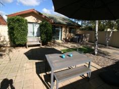 3 Windradyne Street Ngunnawal ACT 2913 Looking to start out or downsize? This easy care 3 bedroom ensuite home could be the answer. An open plan lounge dining area features floating timber flooring and an additional study nook. The kitchen has been partially upgraded with a Caesar stone bench tops, gas hotplates, under bench oven and dishwasher. All 3 bedrooms are carpeted, featuring built ins in all rooms, an ensuite and bay window in the master adding to the space. Internal access leads into a single garage under the roofline. This has been converted to a multi-functional room be could be easily changed back. There is a modern bathroom with bath, separate toilet and laundry with backyard access. The dining area opens through sliding doors onto a sunny north facing back yard. Fully paved and landscaped, the garden is extremely low maintenance and easy care surrounded by colourbond fencing.